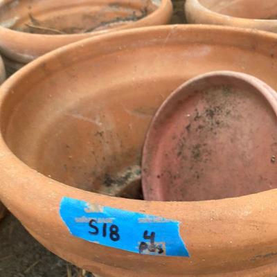 Lot S18: Set of four terra-cotta planters