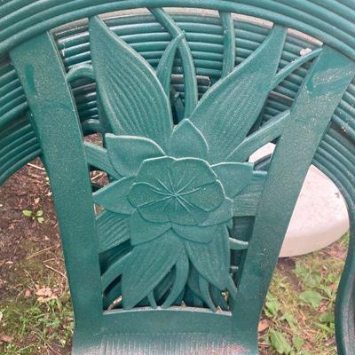 Lot S24: Three plastic outdoor chairs