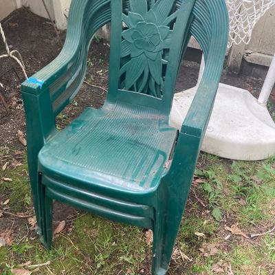 Lot S24: Three plastic outdoor chairs