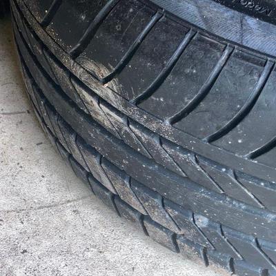Lot S4: Set of four tires/rims for a Jaguar