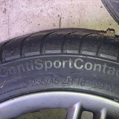 Lot S4: Set of four tires/rims for a Jaguar