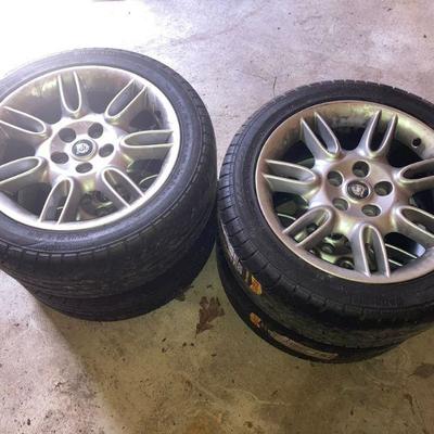Lot S4: Set of four tires/rims for a Jaguar
