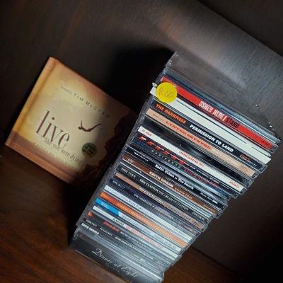 R60: Tall pile of CDs! 