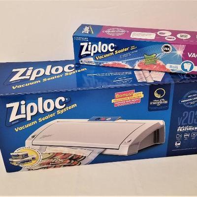 Lot #114  Gently Used Ziploc Vacuum Sealer System with unopened box of film