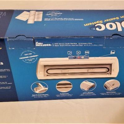 Lot #114  Gently Used Ziploc Vacuum Sealer System with unopened box of film