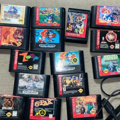 Lot B24: Sega Genesis Console Controllers and Games