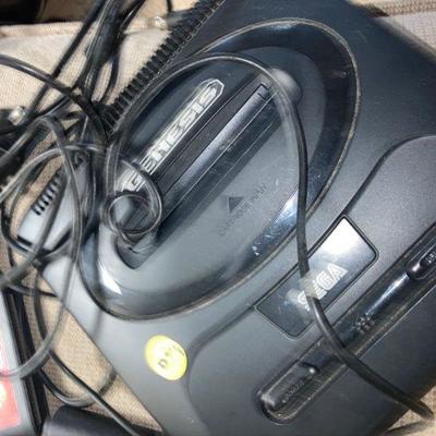 Lot B24: Sega Genesis Console Controllers and Games