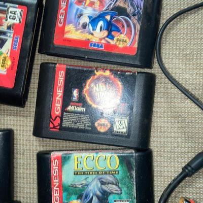 Lot B24: Sega Genesis Console Controllers and Games
