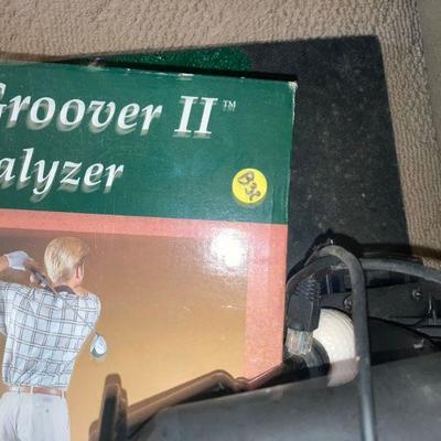 Lot B32: Swing Groover Golf Coach *missing some items*