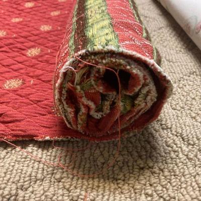 Lot B40: Bolts of fabric/cloth