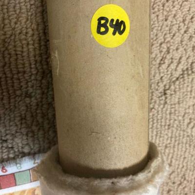 Lot B40: Bolts of fabric/cloth