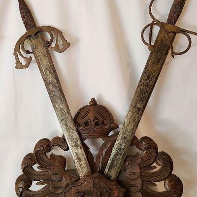 G57: Large Wood Carved Coat of Arms and Swords