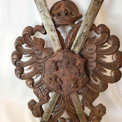 G57: Large Wood Carved Coat of Arms and Swords