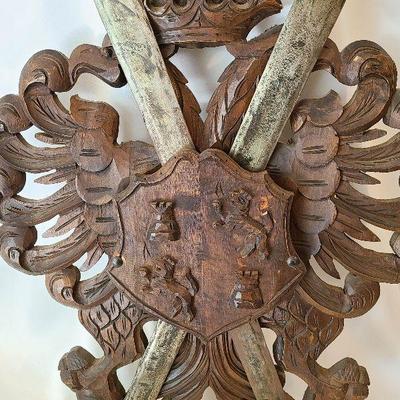 G57: Large Wood Carved Coat of Arms and Swords