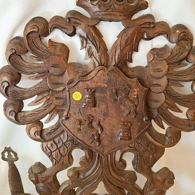 G57: Large Wood Carved Coat of Arms and Swords