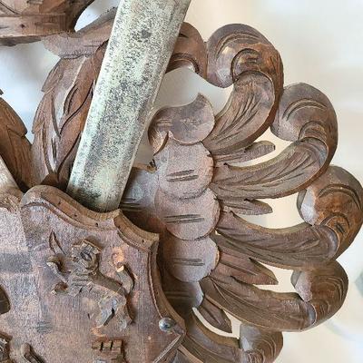 G57: Large Wood Carved Coat of Arms and Swords