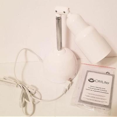 Lot #121  OTT Lite - gently used with book.
