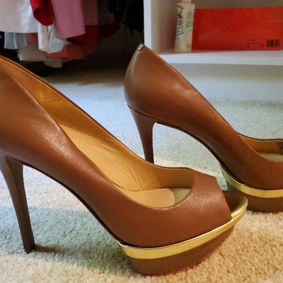 MB-240: four pair of heels size 8 3 are new one pair gently worn