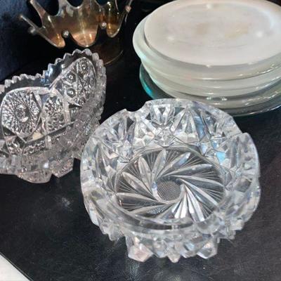 Lot L17: Misc. Home Decor/ Candle Holders/plates incl. silverplated Maitland-Smith piece.