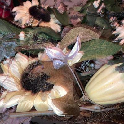 Lot B57: Sprigs and a holiday wreath.