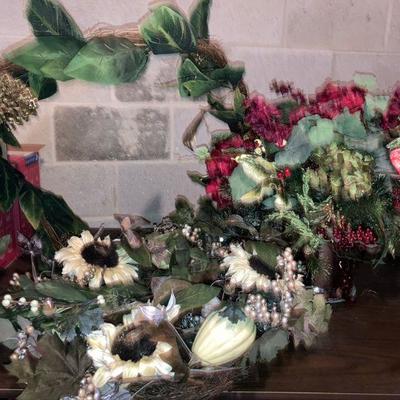 Lot B57: Sprigs and a holiday wreath.