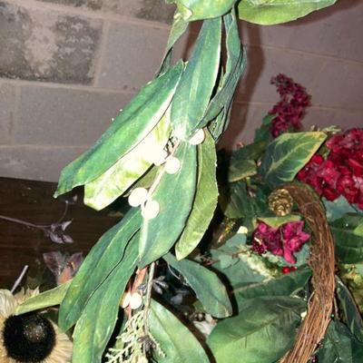 Lot B57: Sprigs and a holiday wreath.