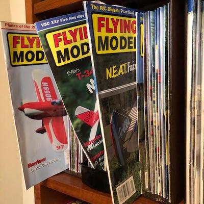 Tall Bookshelf with Vintage Model Plane Magazines 