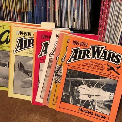 Tall Bookshelf with Vintage Model Plane Magazines 