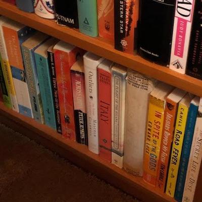 Tall Bookshelf with Assorted Books