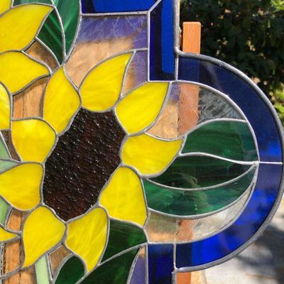 Vibrant Sunflowers and Blue Edged Stained Glass Window