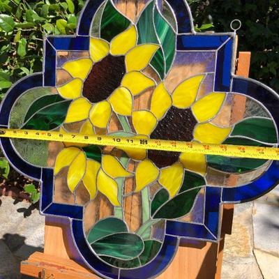 Vibrant Sunflowers and Blue Edged Stained Glass Window