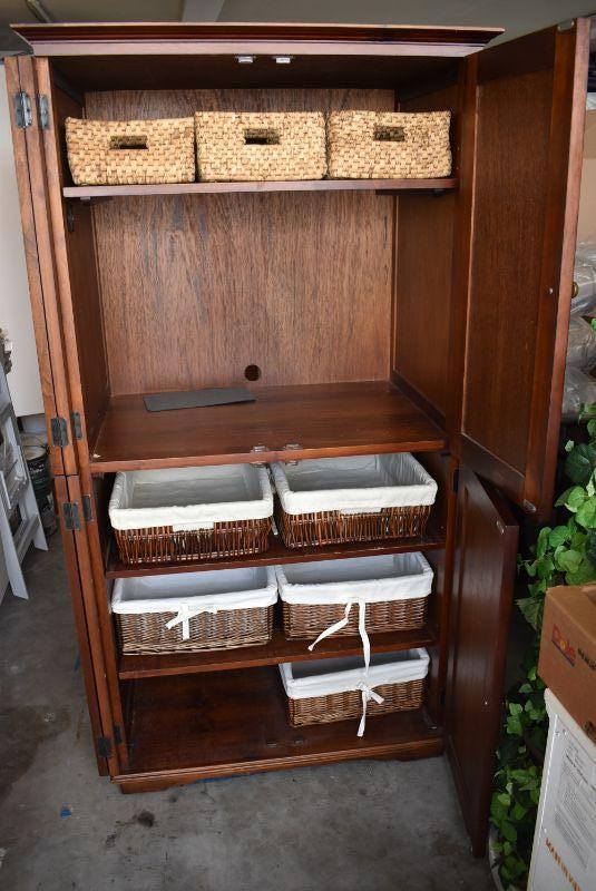 Lot 22, Pier One Imports Armoire with Storage Baskets, could also be media  cabinet | EstateSales.org