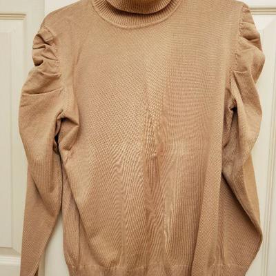 MB-279:   New Sweater size Med. 