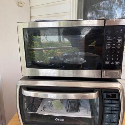 Lot # 792 Microwave / Oster Toaster Oven 