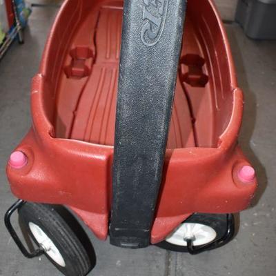 Radio Flyer Plastic Wagon with fold down seats. Front wheels need aligning