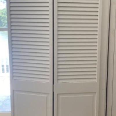 Lot # 935 Large White Bi-Fold Door Bookshelf with Art Books 