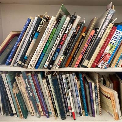 Lot # 935 Large White Bi-Fold Door Bookshelf with Art Books 