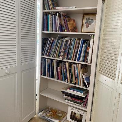 Lot # 937 Large White Bi-Fold Door Bookshelf with Books 