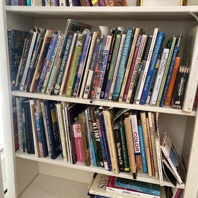 Lot # 937 Large White Bi-Fold Door Bookshelf with Books 