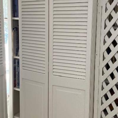 Lot # 937 Large White Bi-Fold Door Bookshelf with Books 