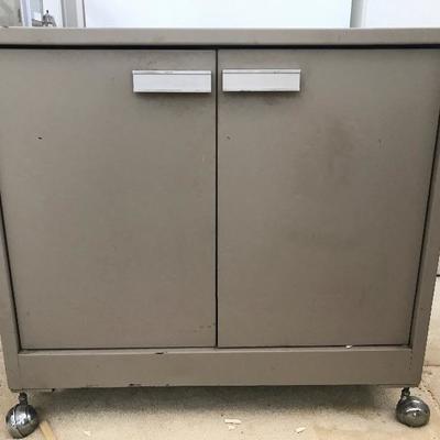 Lot # 1267. 2 Door Cabinet