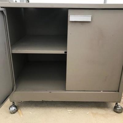 Lot # 1267. 2 Door Cabinet