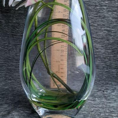 Clear vase with faux Orchids flowers