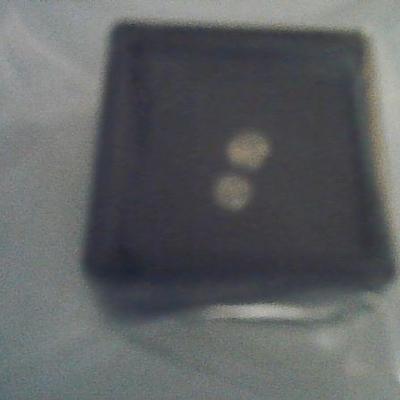 2 LOOSE BROWN DIAMONDS