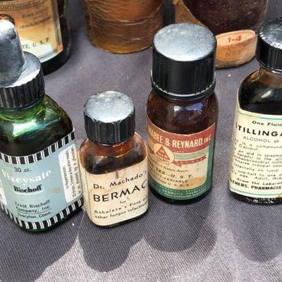 Lot #24; Mixed Lot of Amber, Blue and Clear Vintage Medical Bottles