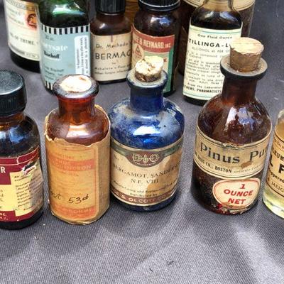 Lot #24; Mixed Lot of Amber, Blue and Clear Vintage Medical Bottles