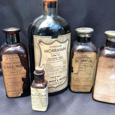 Lot #31: Lot of 8 Vintage Amber Liquid Medicine and Extract Bottles 