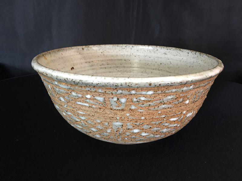 Pottery outlets bowl by Artist Jack Pharo From Wichita Kansas. This has a lovely bright blue and grey glaze with black speckles.