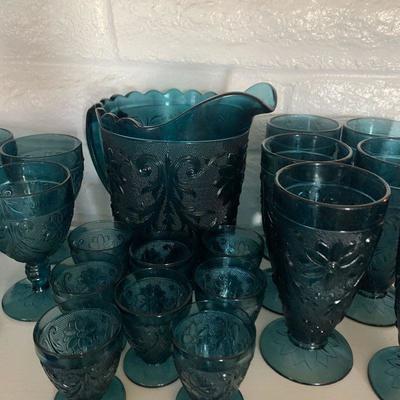 Lot 72 turquoise color pitcher and glasses