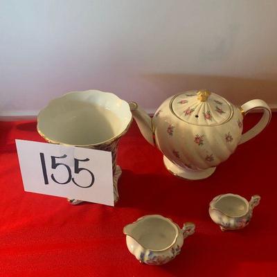 Lot 155 teapot, mini creamers, vase